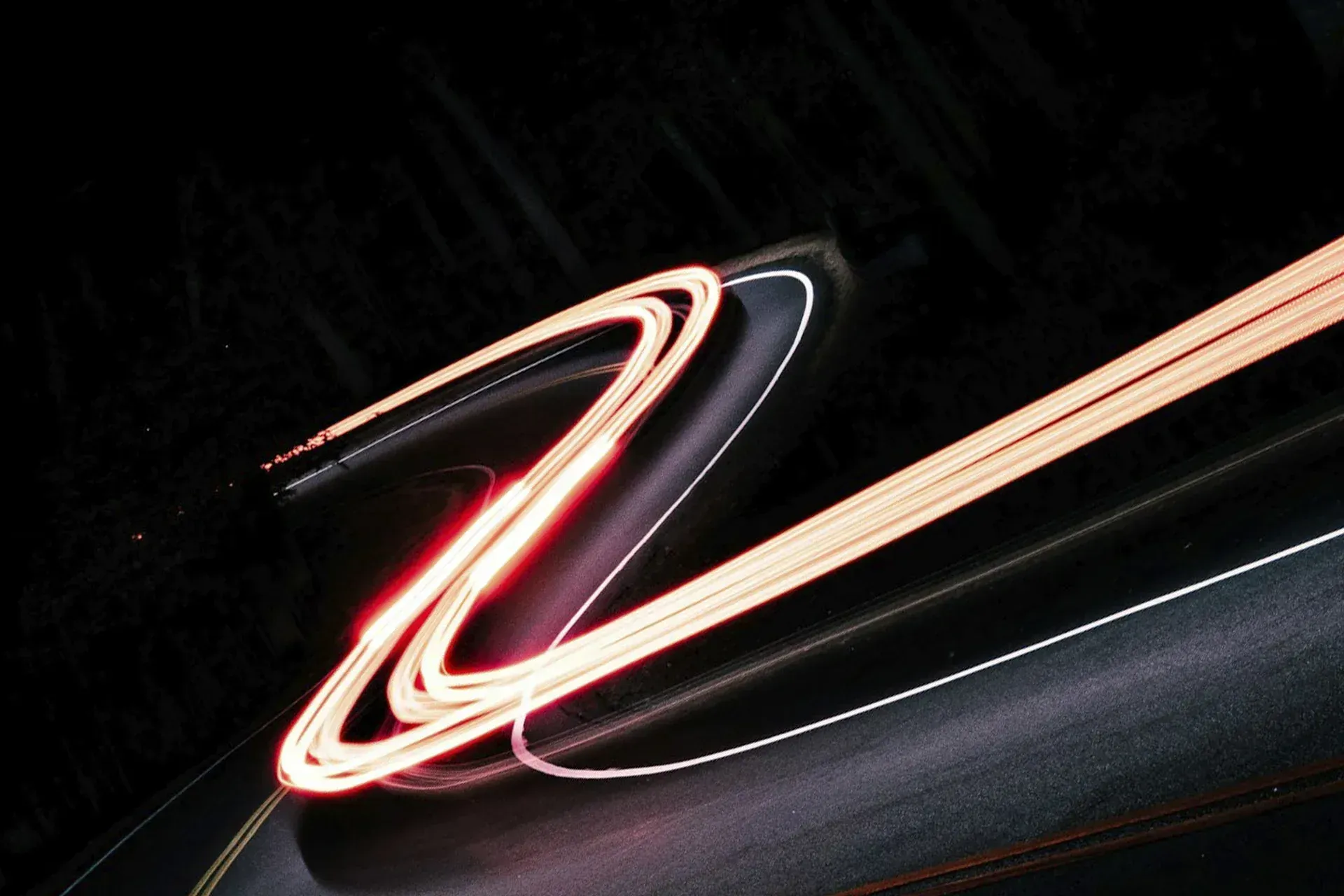 A long exposure photo of a car 's tail light