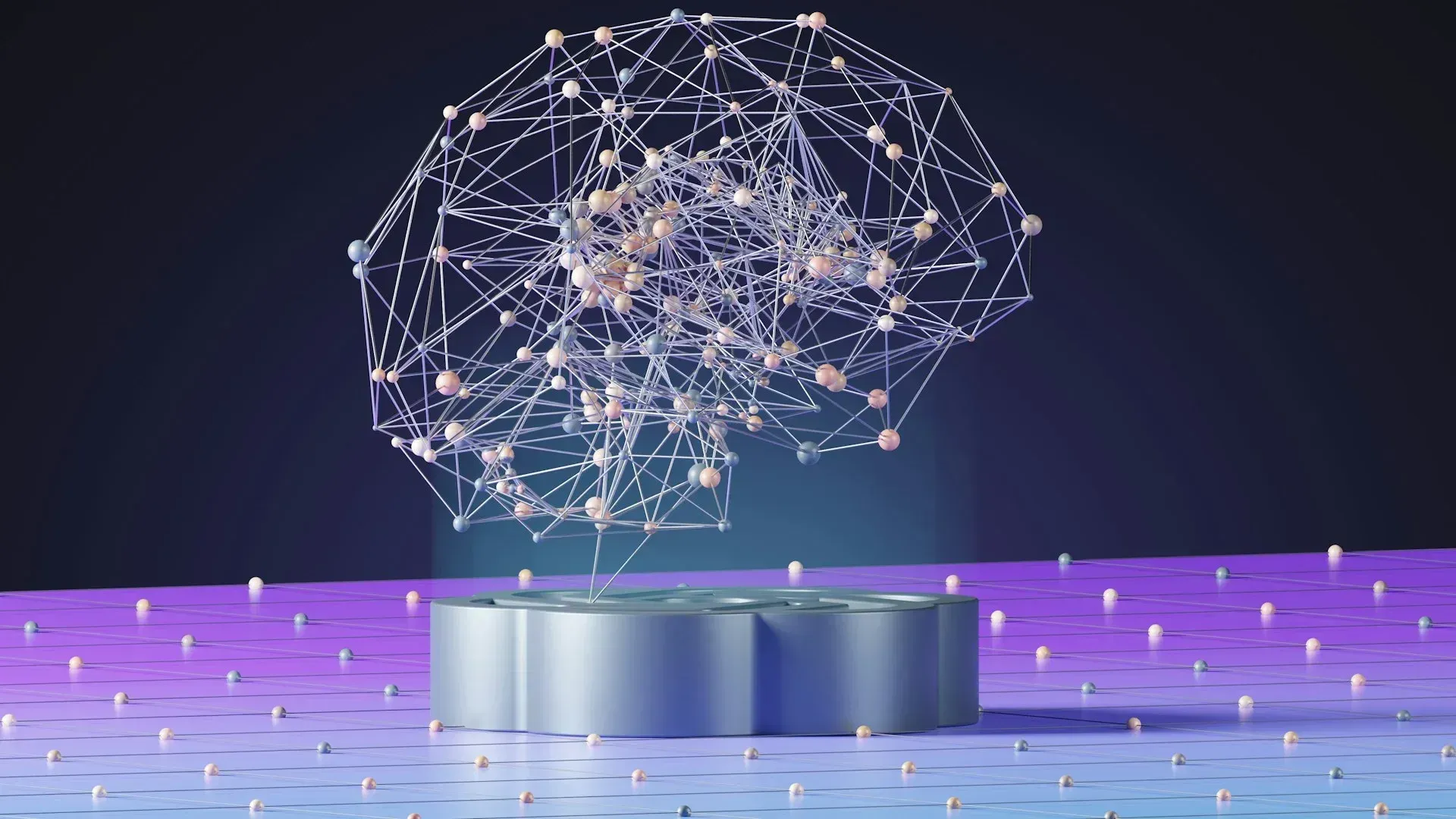 A geometric brain comprised of interconnected nodes hovers above a silver platform, set against dark, futuristic background.